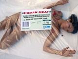 10373-protest_peta_three_people_placed_containers_resembling_supermarket_meat_trays