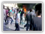 Iranian protesters burning police station